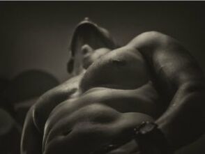 A naked man who raised a penis gel
